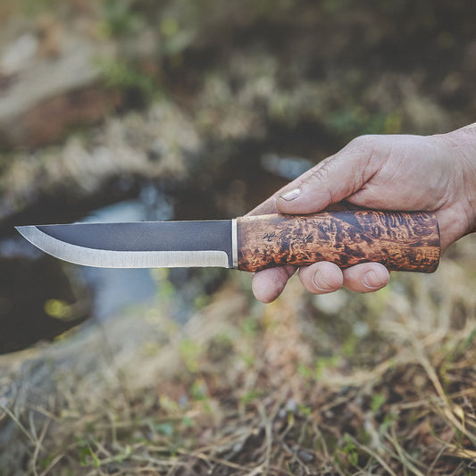Rosellis Finnish Hunting knife with a long carbon steel blade for hunting, camping and outdoor activities.