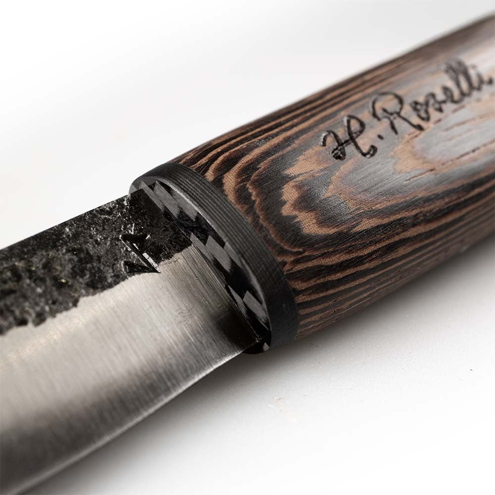 Roselli's limited edition knife "Carpenter knife black edition". Made from exclusive laminated carbon steel, wenge wood handle with carbon fiber ferrule. Comes with a handmade leather sheath in black. 